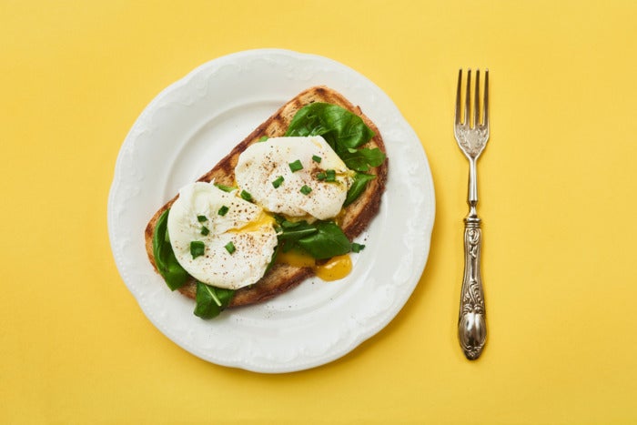 Plate with poached eggs on toast.